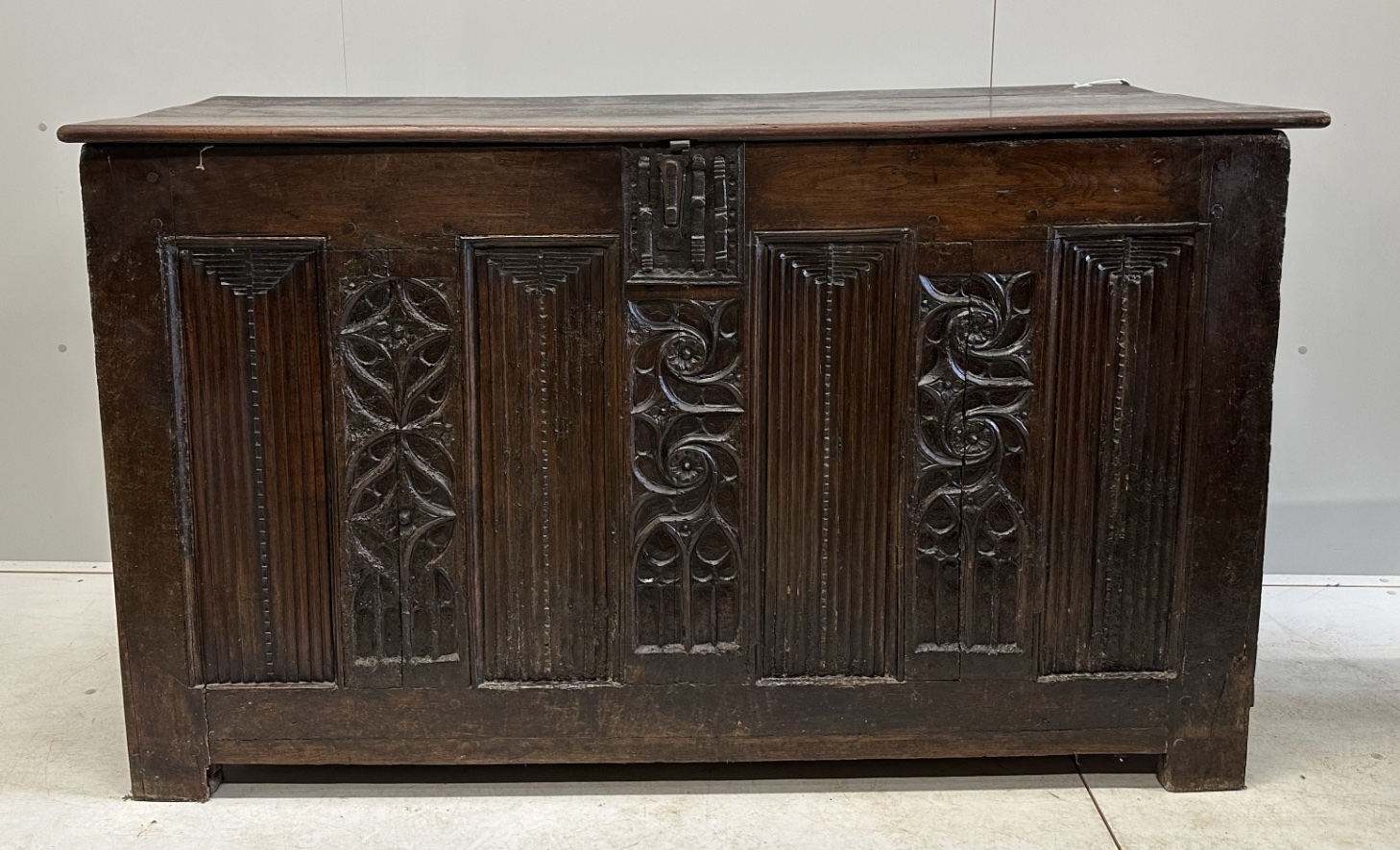 A 16th century French oak coffer, width 162cm, depth 66cm, height 96cm, top loose